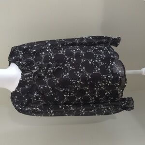 Lovely lined sheer black blouse.